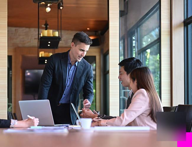 A group of professionals discussing how network security works