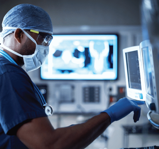 A doctor reviews patient information prior to surgery.